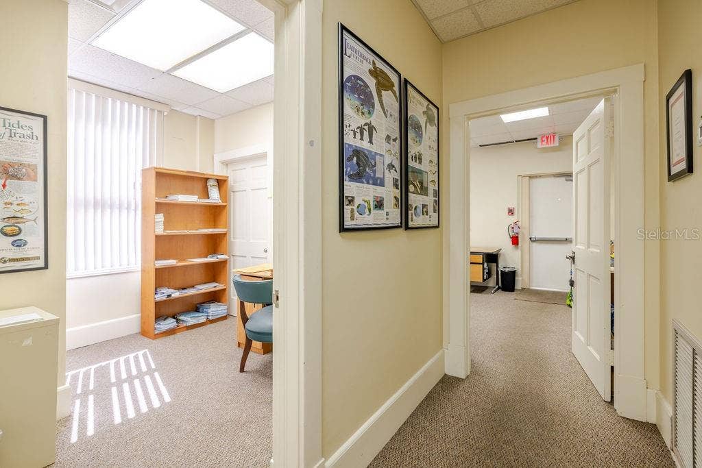 440 S BEACH STREET, Daytona Beach, FL 32114 First floor hallway leading to fire escape.