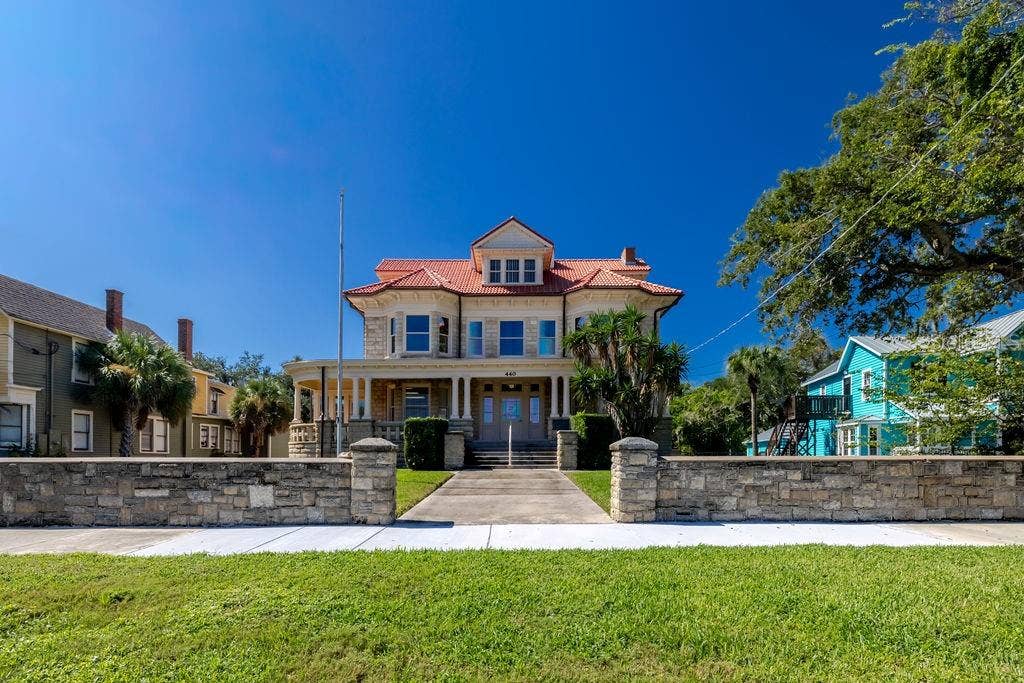 440 S BEACH STREET, Daytona Beach, FL 32114 Front of building with historic architecture and stone entrance.