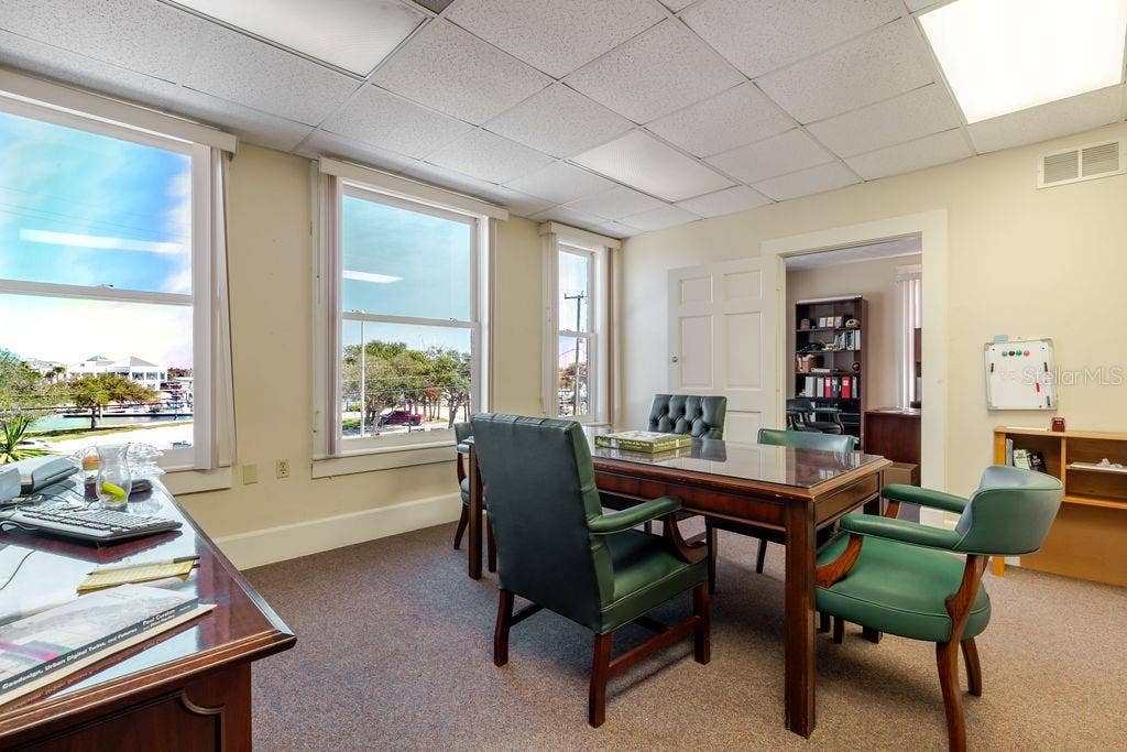 440 S BEACH STREET, Daytona Beach, FL 32114 Second floor conference area with oversized historic windows.
