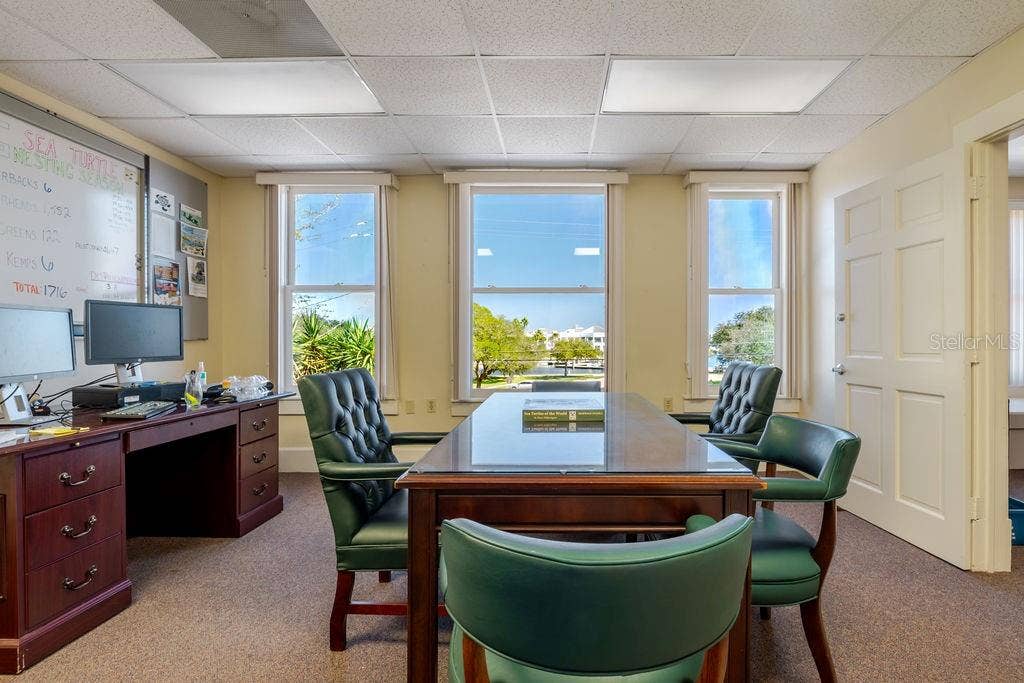 440 S BEACH STREET, Daytona Beach, FL 32114 Second floor office and conference area with historic doors.
