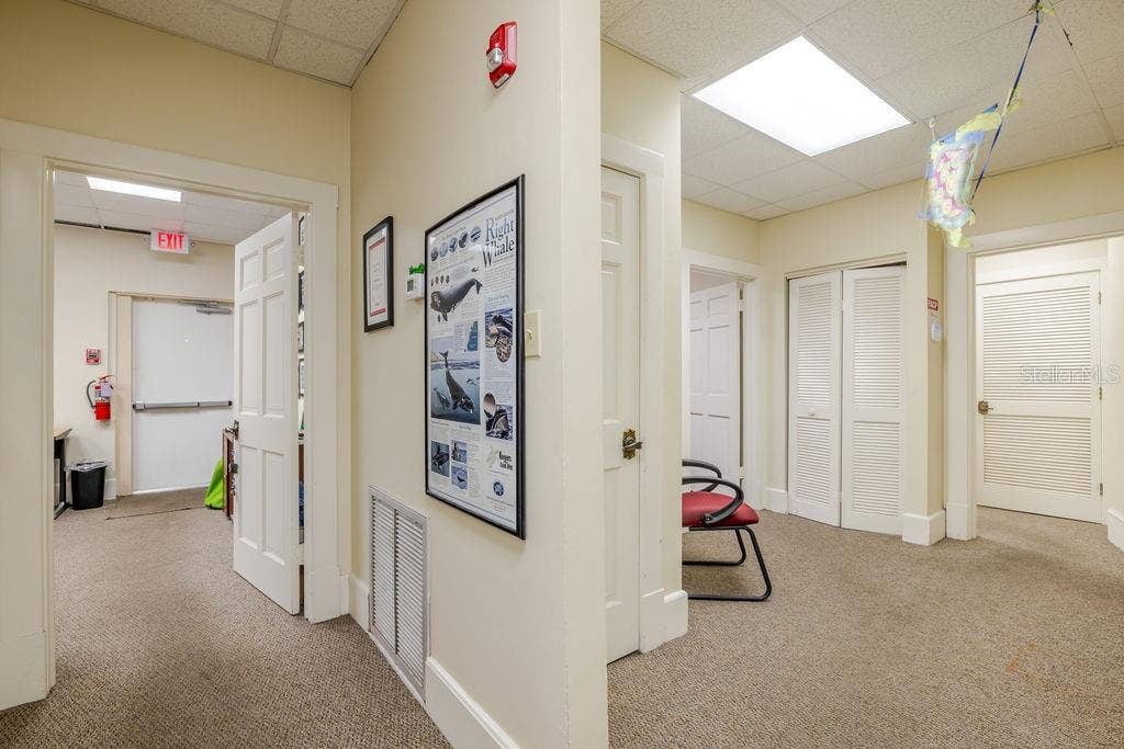 440 S BEACH STREET, Daytona Beach, FL 32114 First floor back foyer and exit to fire escape.
