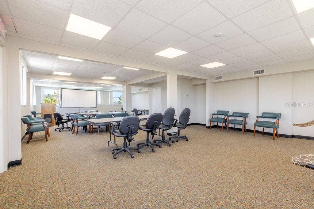 440 S BEACH STREET, Daytona Beach, FL 32114 Third floor conference room with wrap around windows.