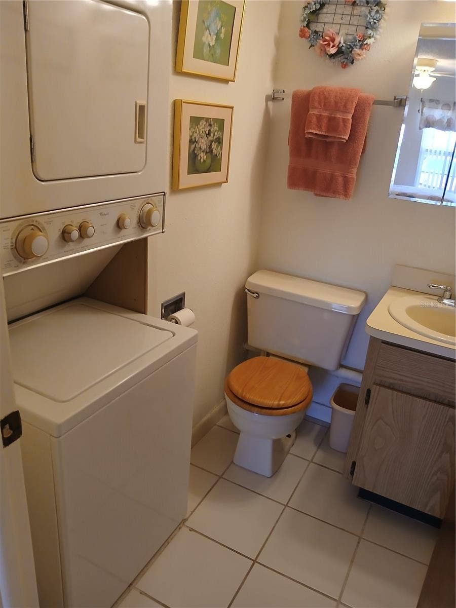 6050 CHESHAM DRIVE, #3, New Port Richey, FL 34653 WASHER/DRYER IN HALF BATH