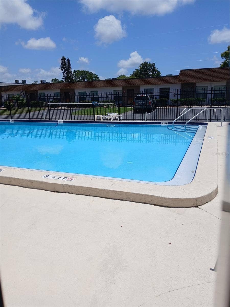 6050 CHESHAM DRIVE, #3, New Port Richey, FL 34653 COMMUNITY POOL