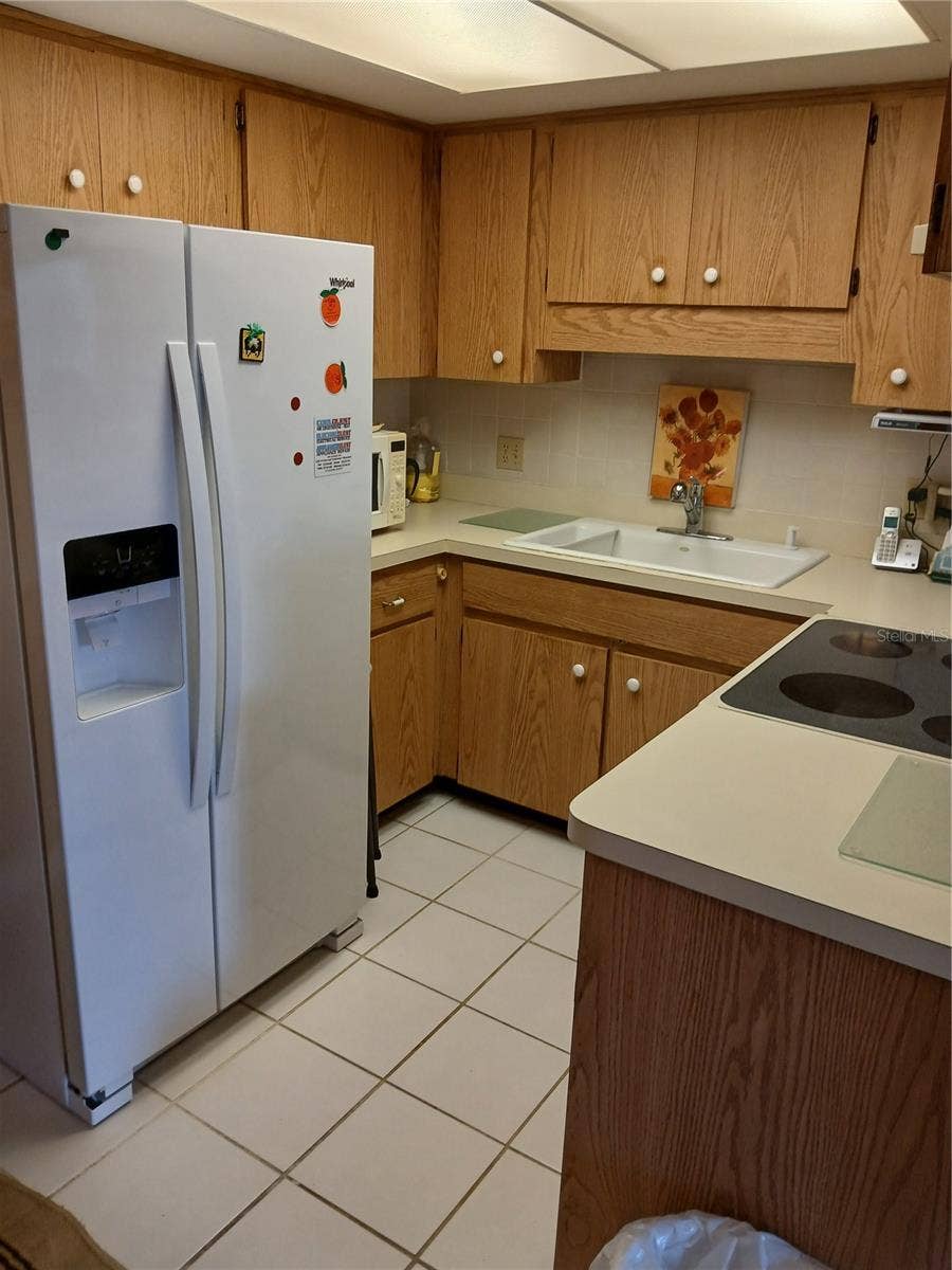 6050 CHESHAM DRIVE, #3, New Port Richey, FL 34653 KITCHEN