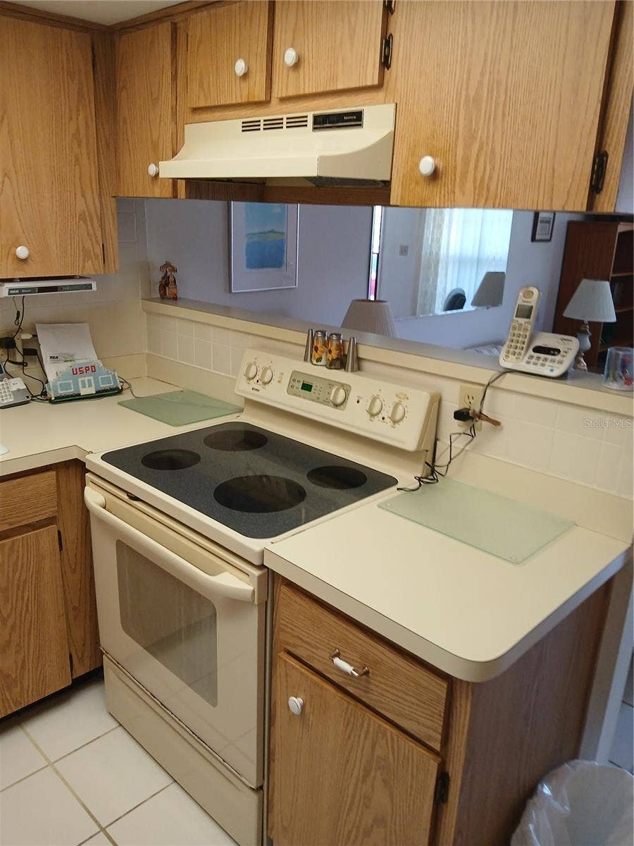 6050 CHESHAM DRIVE, #3, New Port Richey, FL 34653 KITCHEN
