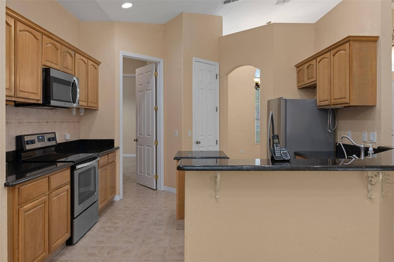17948 GREENSBORO STREET, Spring Hill, FL 34610 There are wonderful granite counter-tops in the kitchen