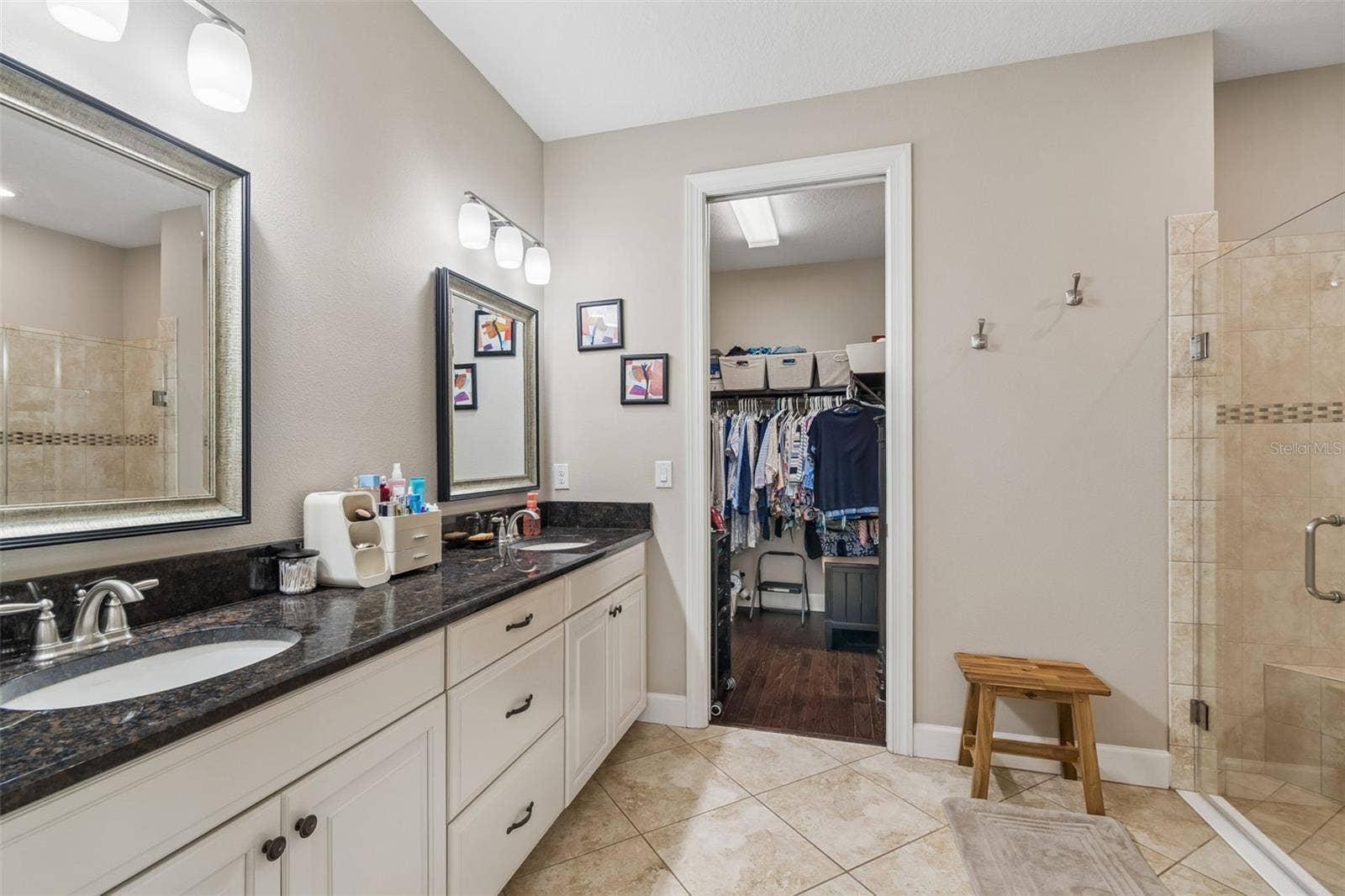 11503 CALLISIA DRIVE, Odessa, FL 33556 Primary ensuite, dual sinks, glass enclosed shower with bench and large walk-in closet
