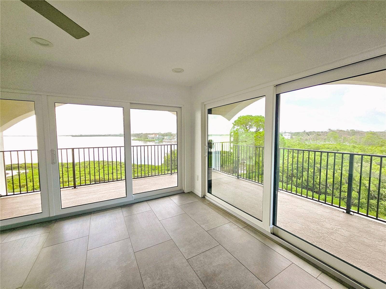 243 MARINER DRIVE, #243, Tarpon Springs, FL 34689 60' Balcony with Direct Gulf and Preserve Views