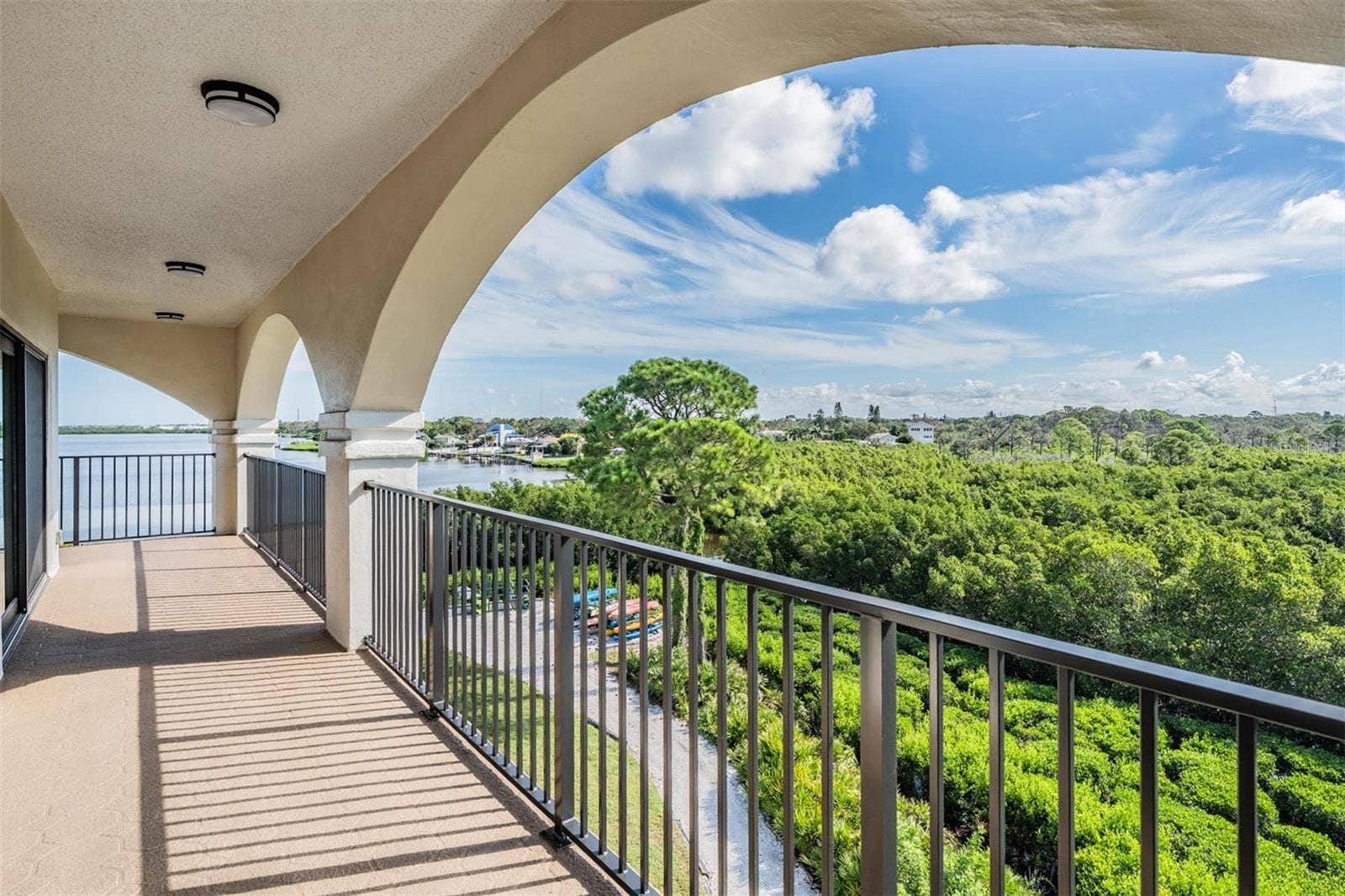 243 MARINER DRIVE, #243, Tarpon Springs, FL 34689 Side Balcony View of Nature Preserve