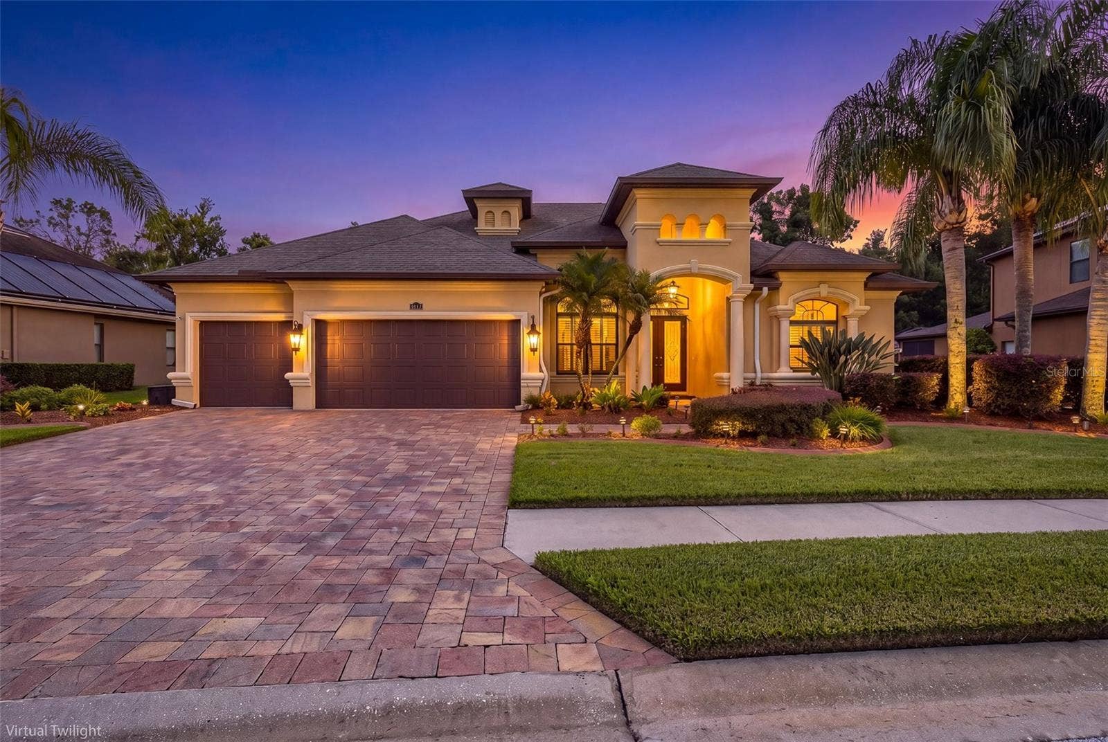 15312 AZRA DRIVE, Odessa, FL 33556 Front of Home with Virtual Twilight