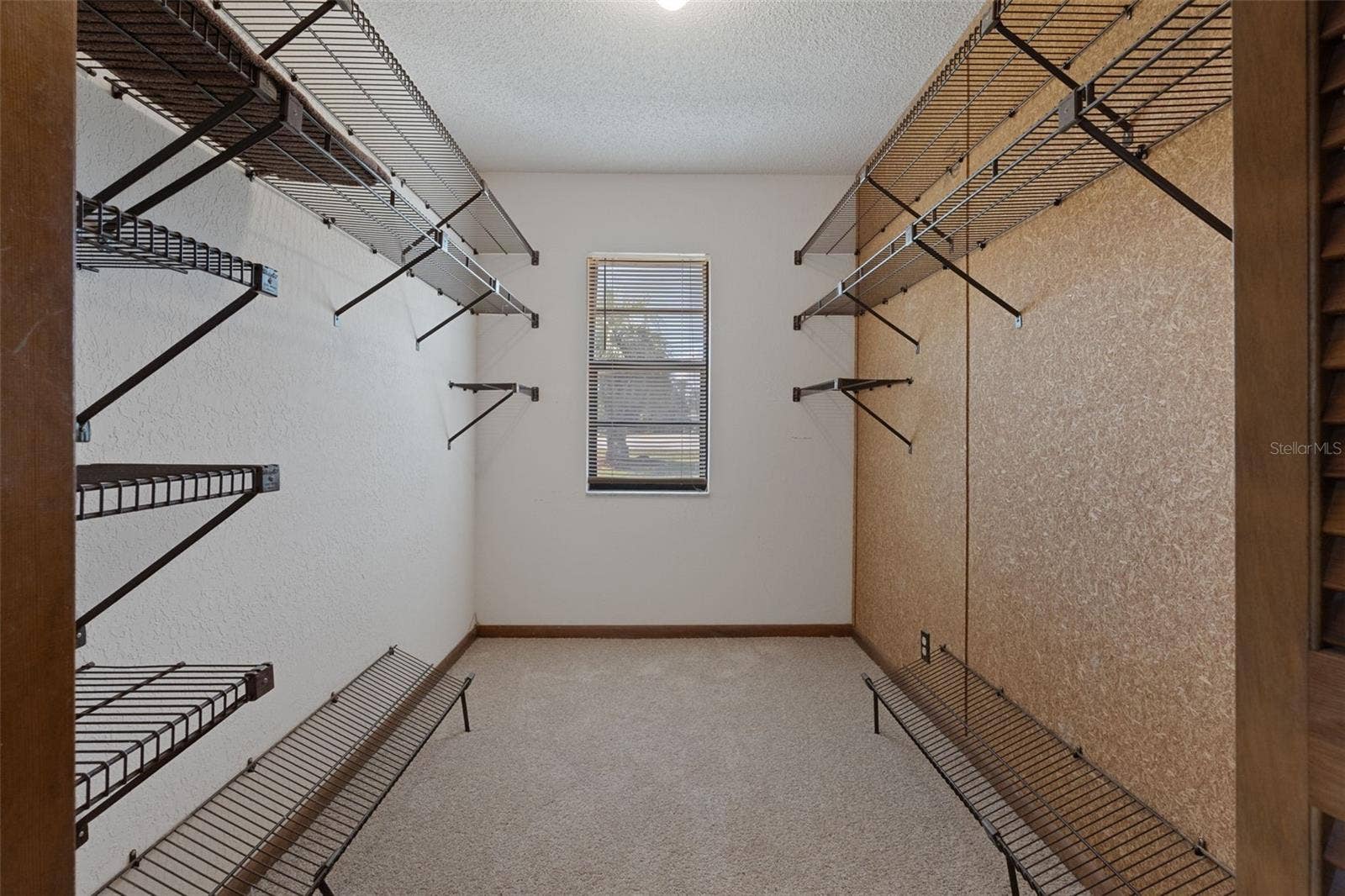 9009 HEATHER BOULEVARD, Weeki Wachee, FL 34613 Master Walk-In Closet