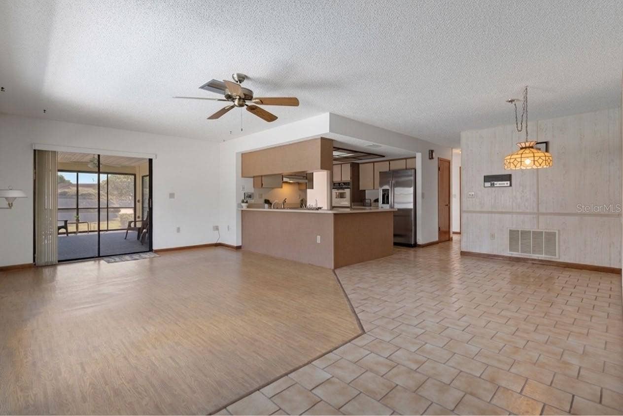 9009 HEATHER BOULEVARD, Weeki Wachee, FL 34613 Kitchen is open to the family room