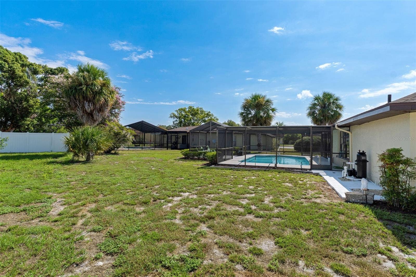 9009 HEATHER BOULEVARD, Weeki Wachee, FL 34613 Left side of the home