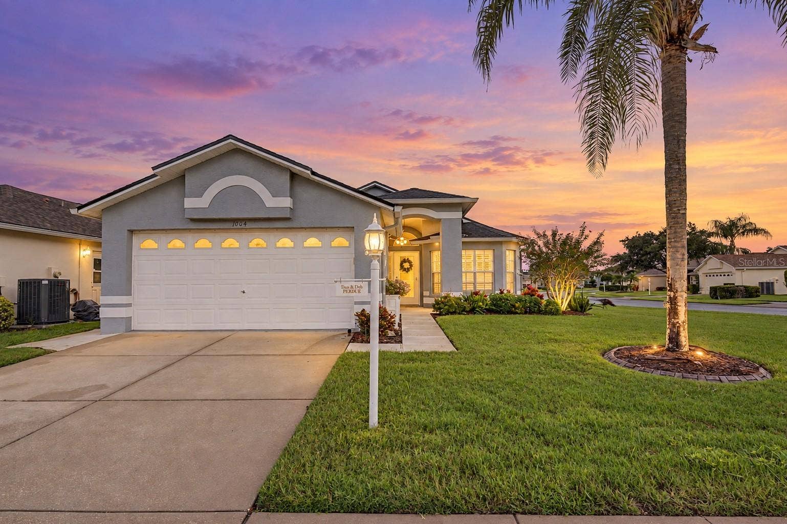 1004 SWEET JASMINE DRIVE, Trinity, FL 34655 A welcoming covered entry