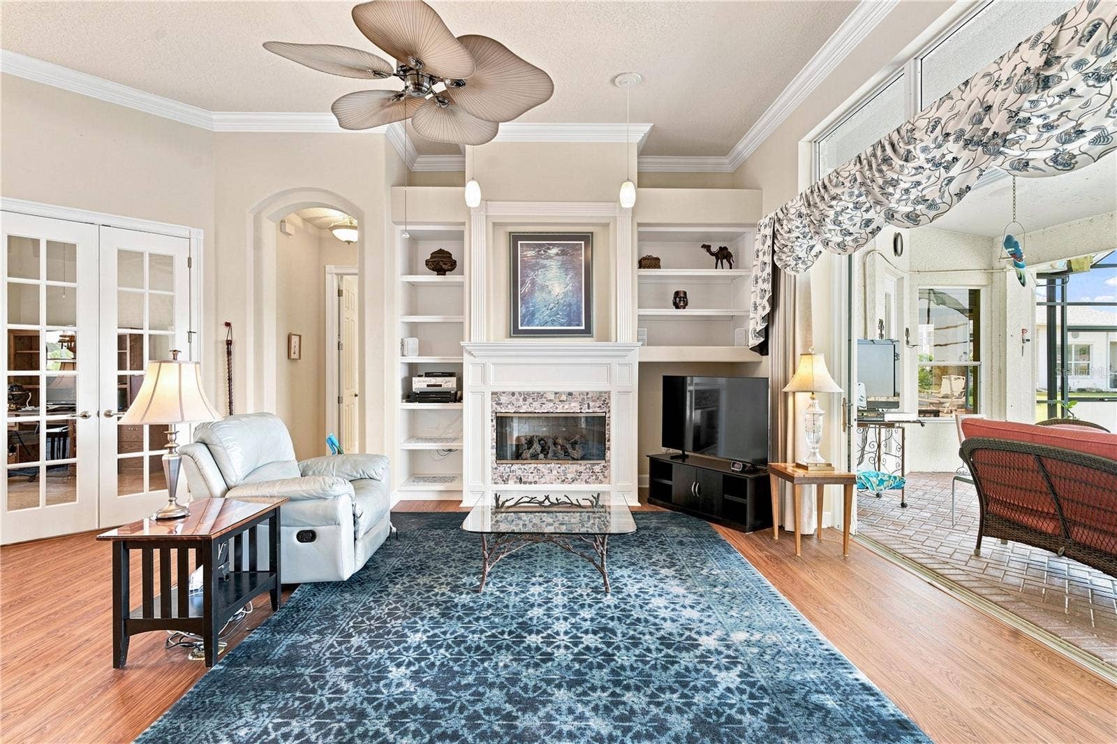 9271 WESTSHORE DRIVE, Weeki Wachee, FL 34613 Livingroom 12 foot celling pocket glass doors