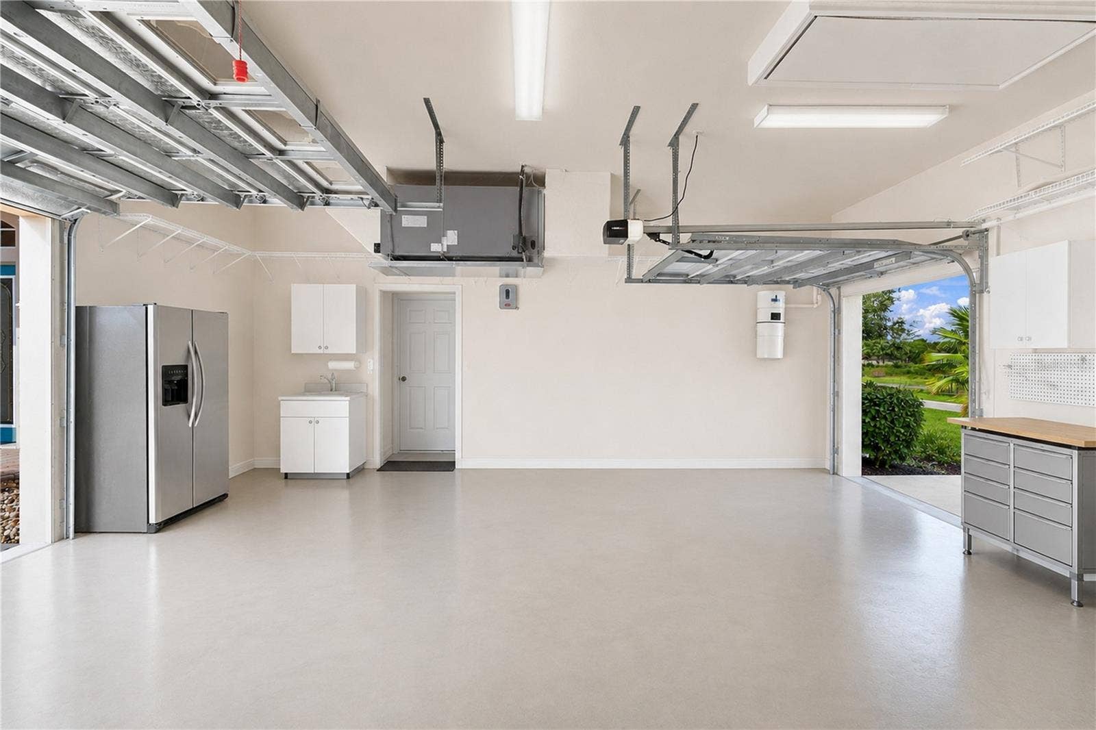 9271 WESTSHORE DRIVE, Weeki Wachee, FL 34613 Two car garage, plus Golf Cart Separate entrance door