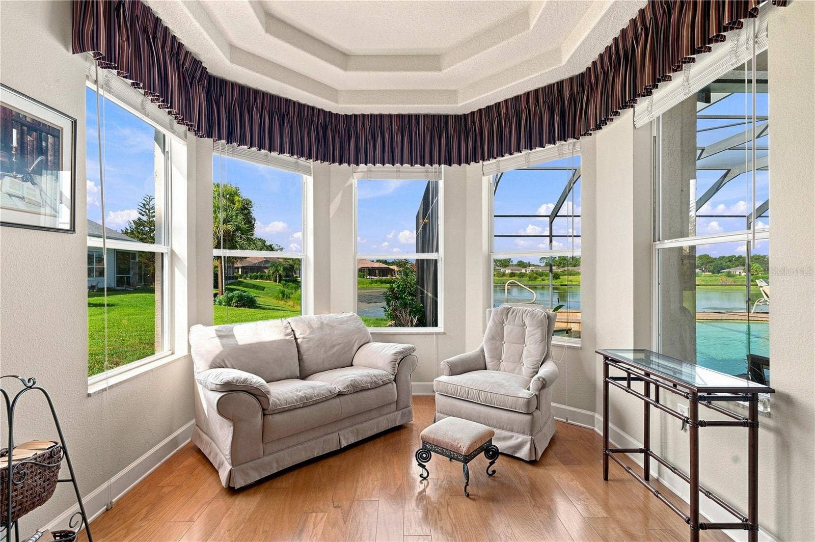 9271 WESTSHORE DRIVE, Weeki Wachee, FL 34613 Sitting area in primary bedroom with water view