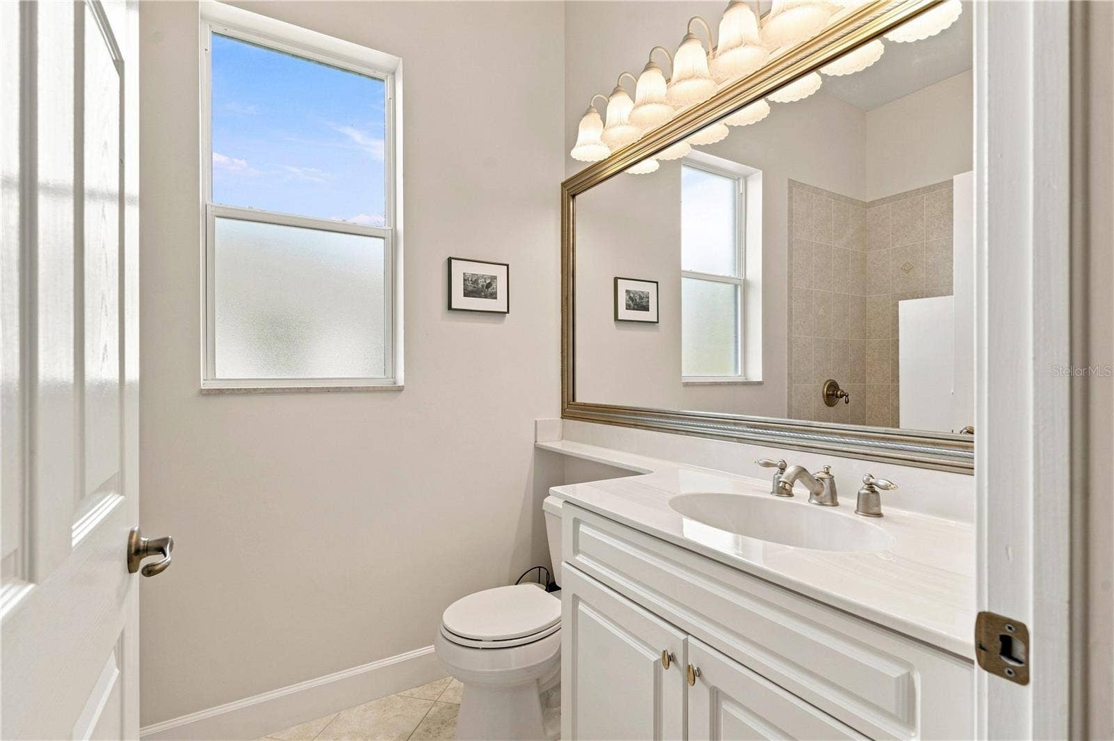 9271 WESTSHORE DRIVE, Weeki Wachee, FL 34613 walk-in shower with tile Bathroom #one