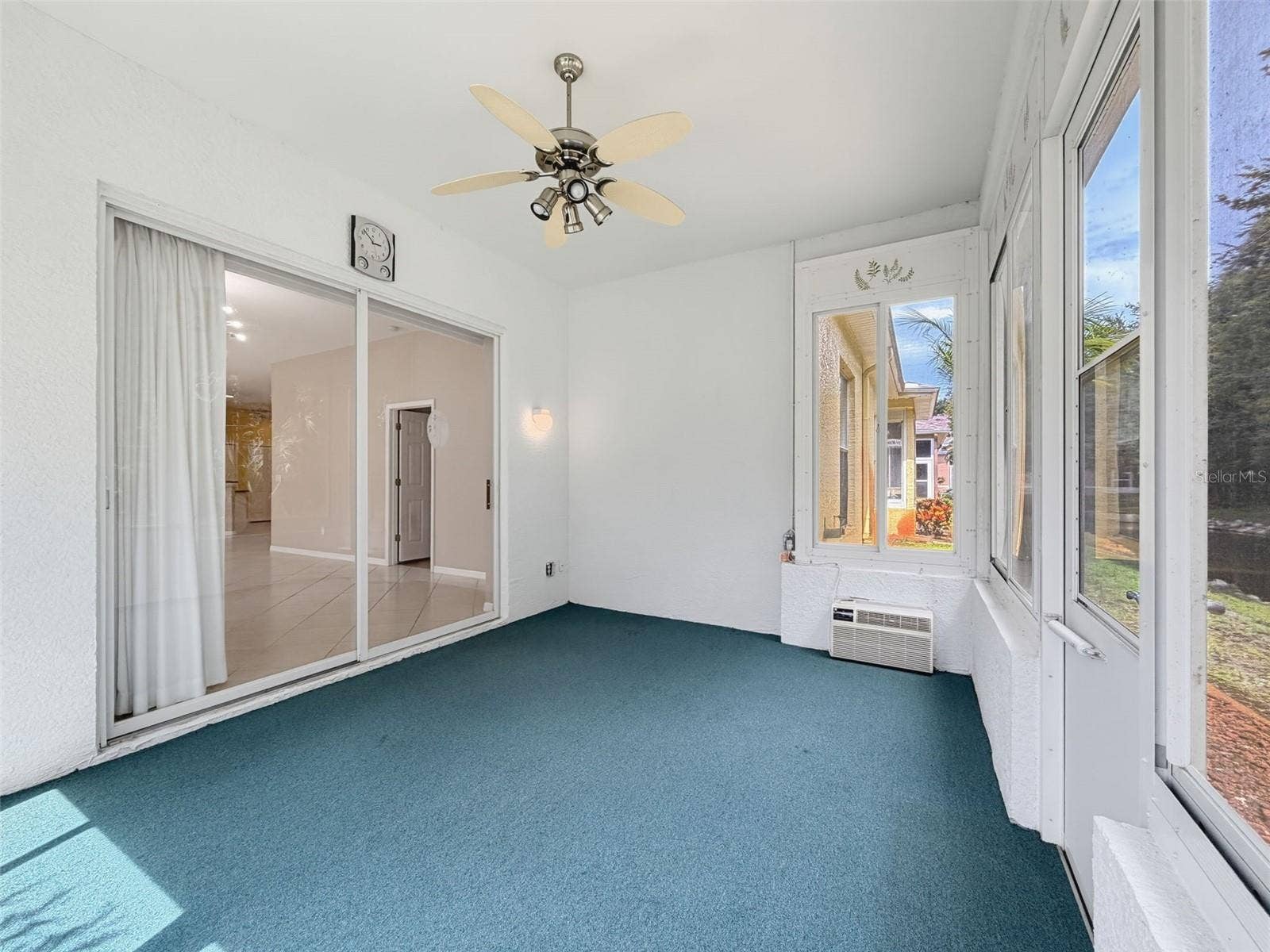 11440 GOLF ROUND DRIVE, New Port Richey, FL 34654 Rear screen room with vinyl windows