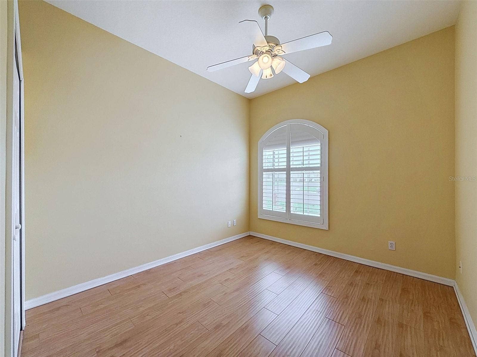 11440 GOLF ROUND DRIVE, New Port Richey, FL 34654 Bedroom 3 with shutters