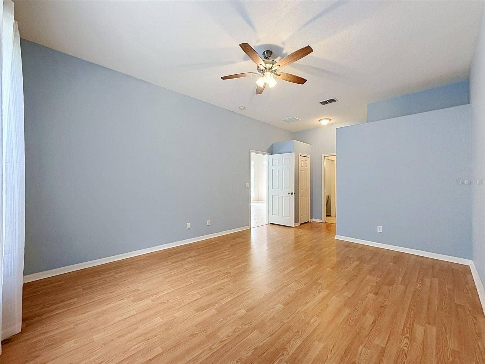 11440 GOLF ROUND DRIVE, New Port Richey, FL 34654 Primary Bedroom with ensuite and walk-in closet
