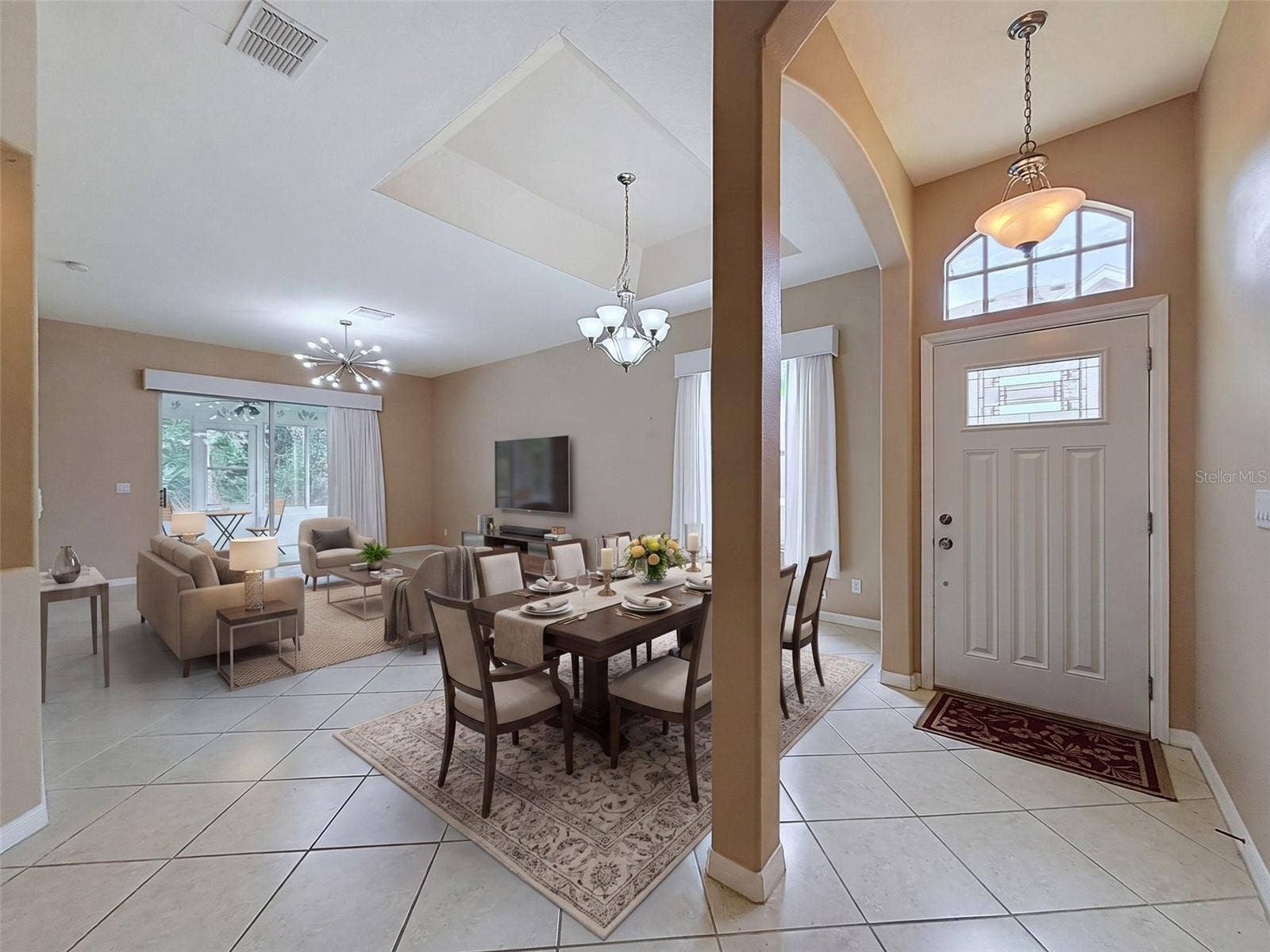 11440 GOLF ROUND DRIVE, New Port Richey, FL 34654 Side entry with arch into main living area
