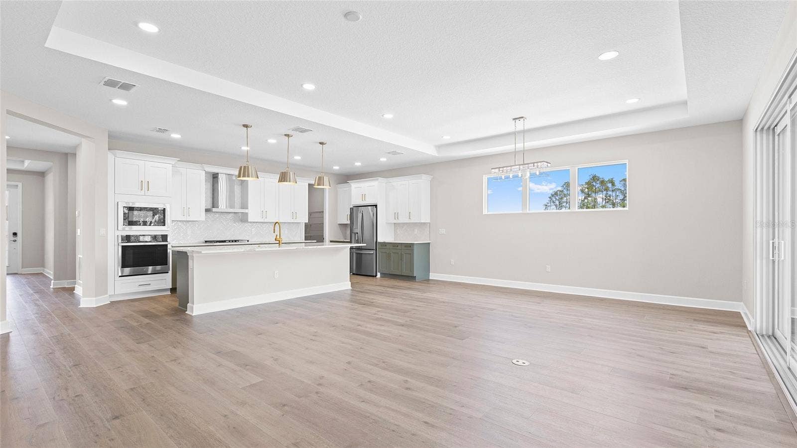 1293 TWIN FARMS COURT, Deland, FL 32724 Great Room to Kitchen