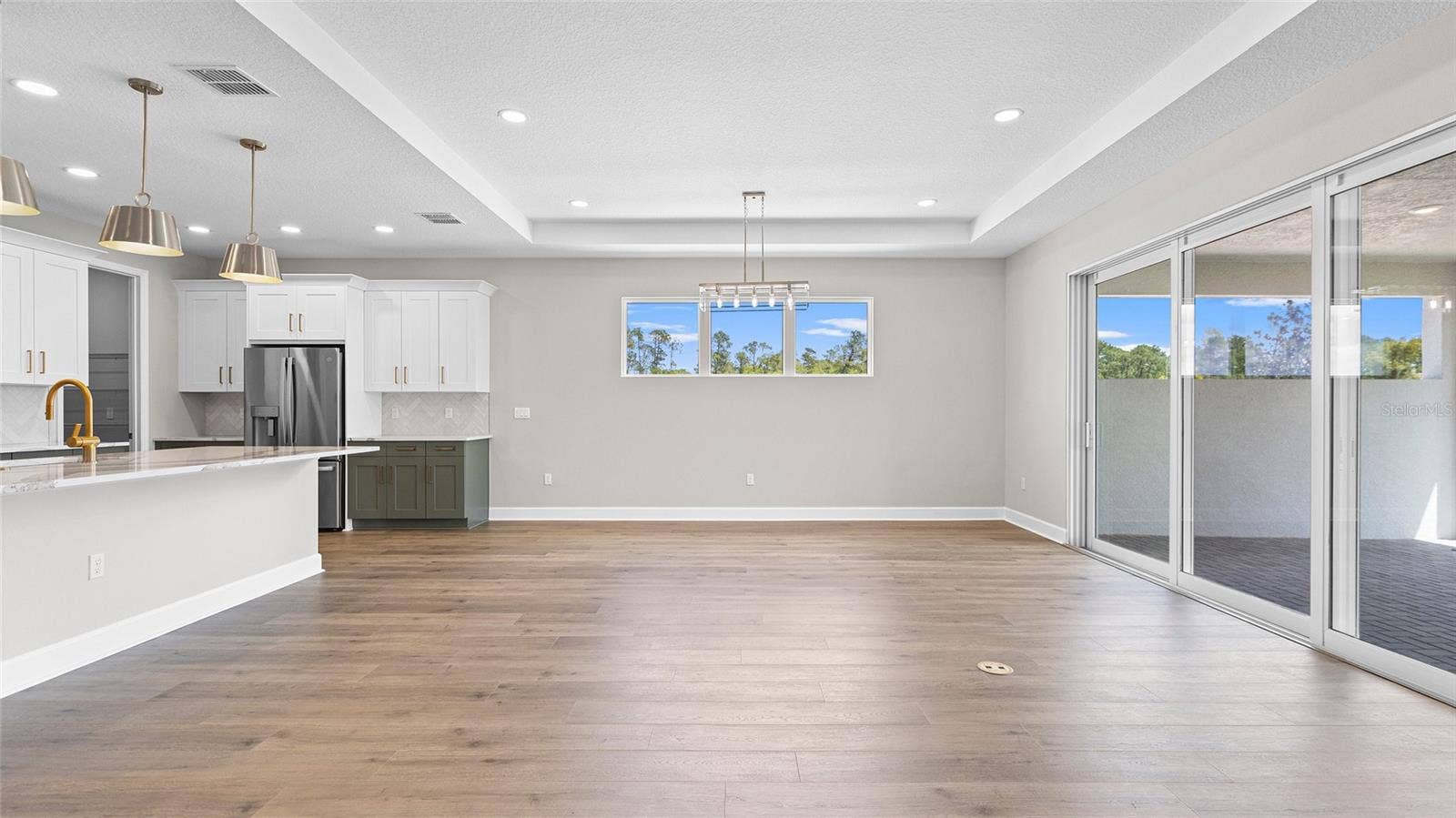 1293 TWIN FARMS COURT, Deland, FL 32724 Great Room to Dining