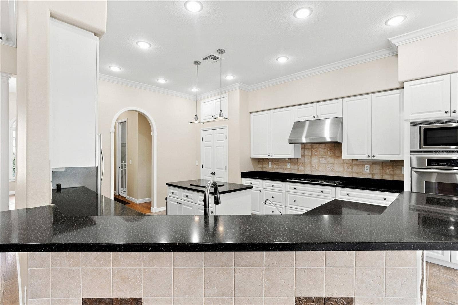 8698 MISSISSIPPI RUN, Weeki Wachee, FL 34613 Bedroom One wood floors, Walk-in Closet