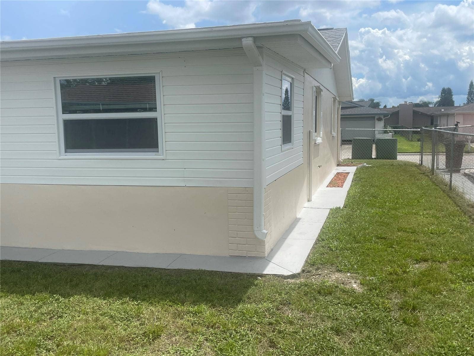 7025 CUTTY SARK DRIVE, Port Richey, FL 34668 OTHER SIDE OF HOUSE