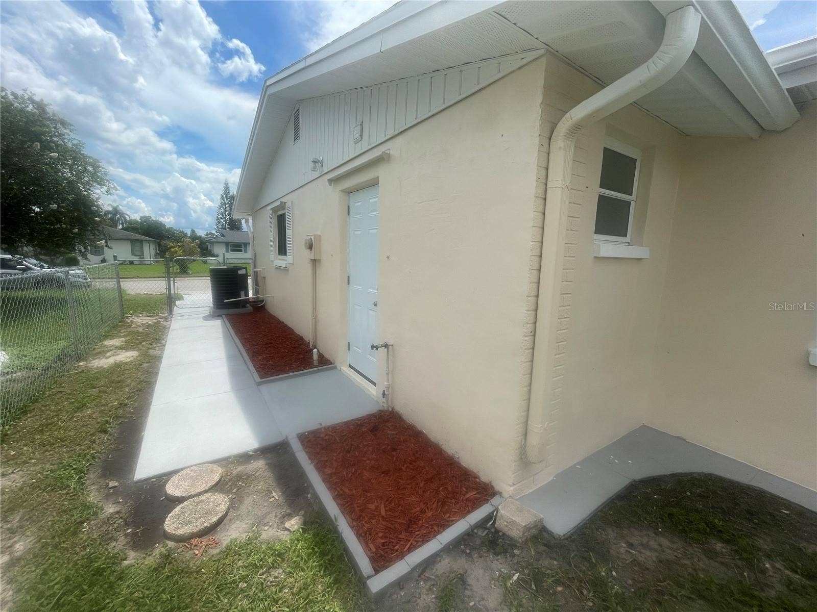 7025 CUTTY SARK DRIVE, Port Richey, FL 34668 SIDE OF HOUSE