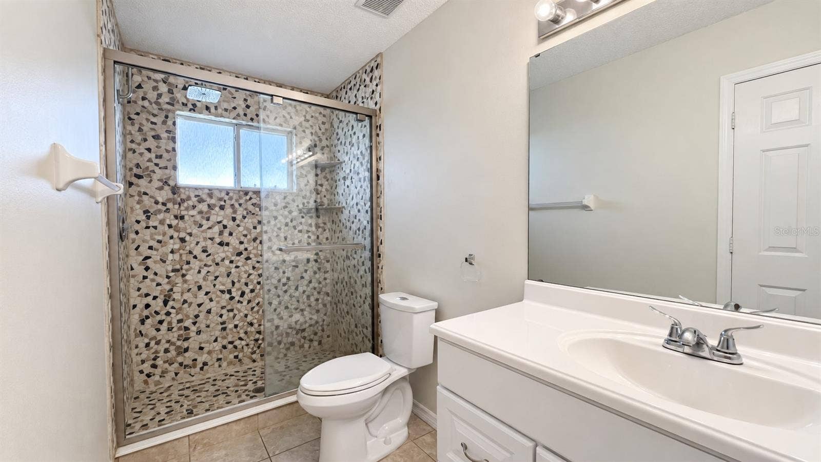 6501 SW 84TH PLACE ROAD, Ocala, FL 34476 Master bedroom en-suite bath with large WIC.