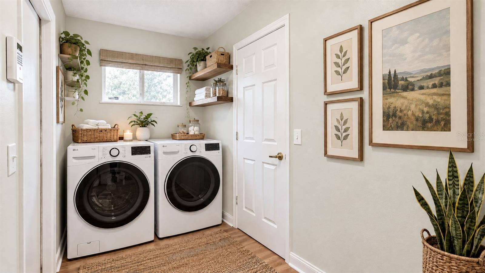 6501 SW 84TH PLACE ROAD, Ocala, FL 34476 Large laundry room with tons of storage possibilities on the opposite side. Virtually staged.