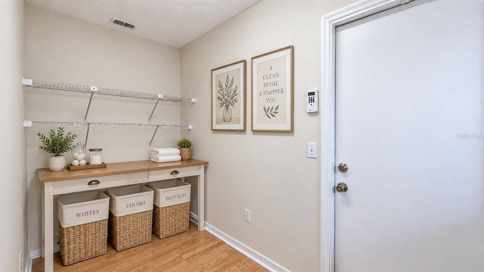 6501 SW 84TH PLACE ROAD, Ocala, FL 34476 Large laundry room with tons of storage possibilities. W/D on the other side. Door leads to garage.