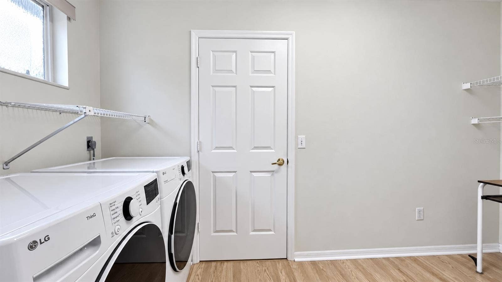 6501 SW 84TH PLACE ROAD, Ocala, FL 34476 Large laundry room with tons of storage possibilities.