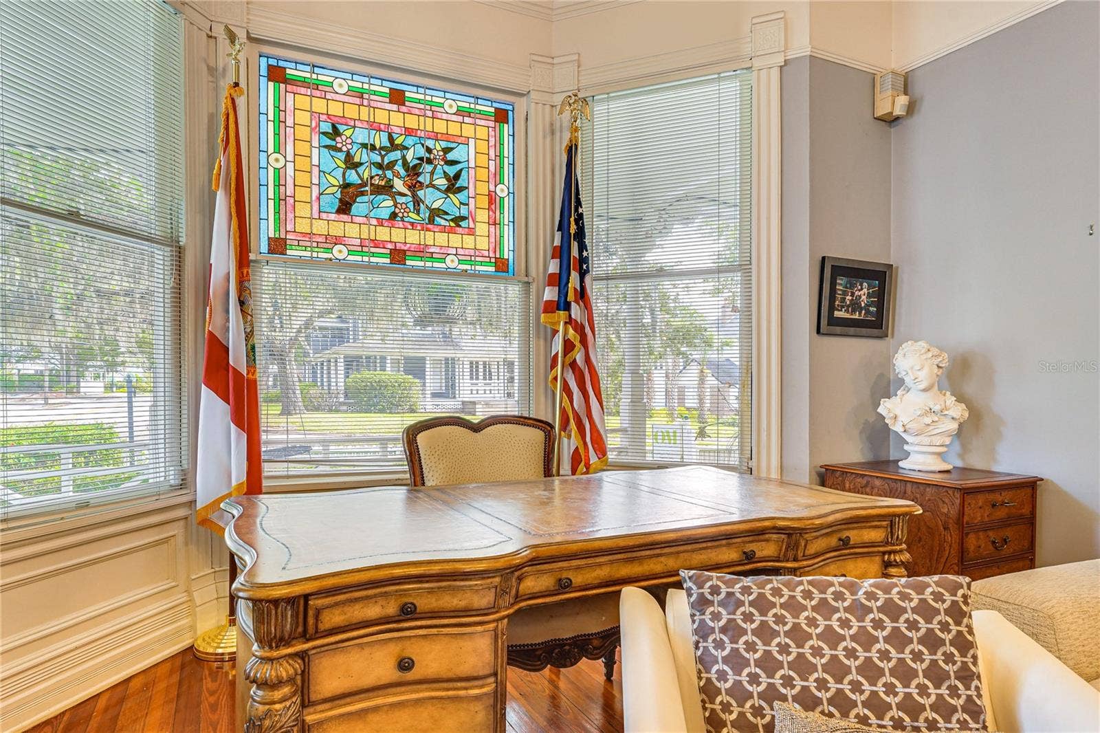 743 E FORT KING STREET, Ocala, FL 34471 Living Room with Bay Window and Stained Glass
