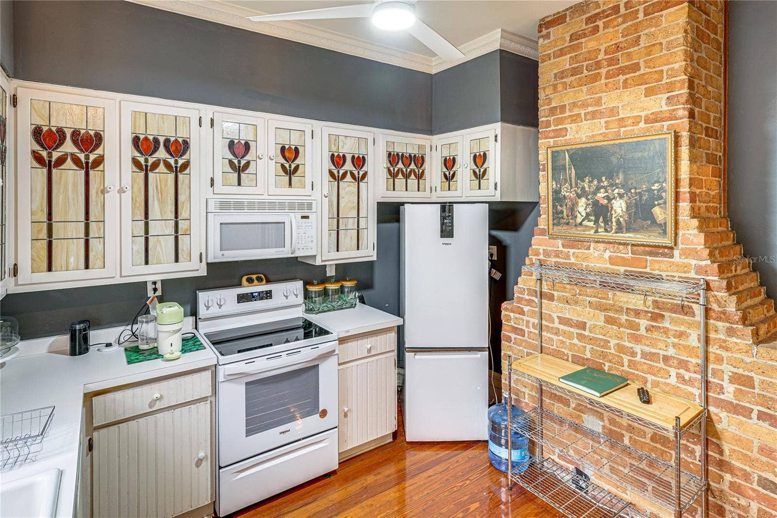 743 E FORT KING STREET, Ocala, FL 34471 Second Kitchen with Exposed Brick Detail