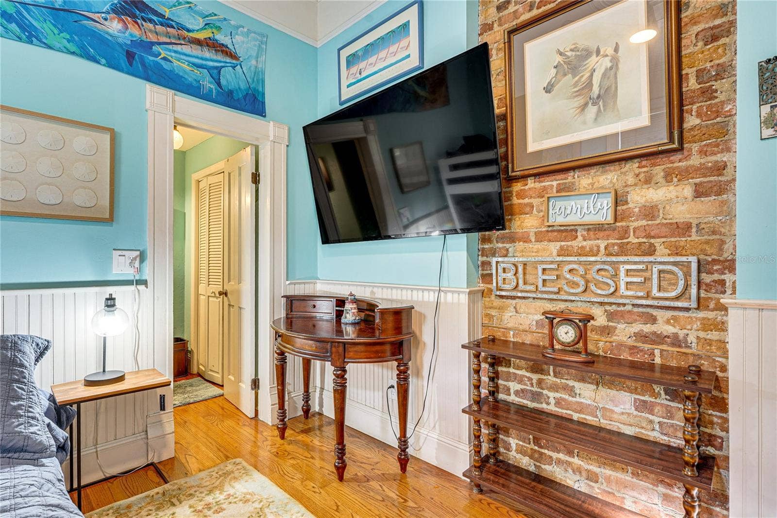 743 E FORT KING STREET, Ocala, FL 34471 Bedroom with Exposed Brick Fireplace