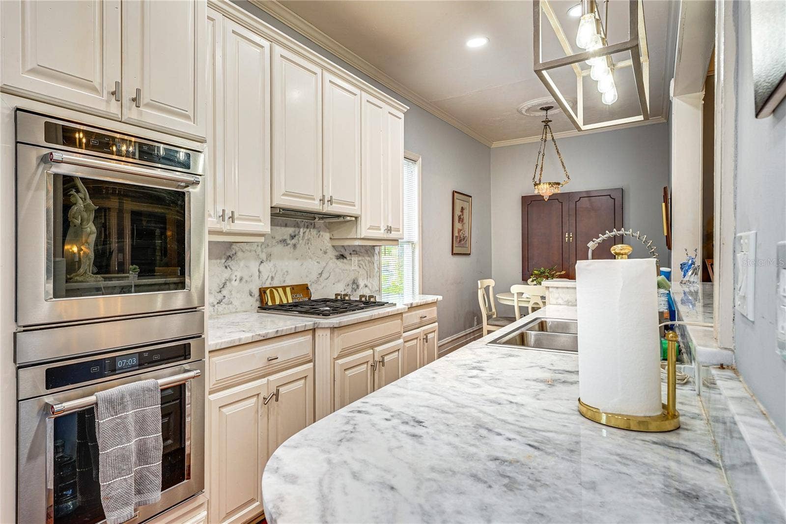 743 E FORT KING STREET, Ocala, FL 34471 Kitchen with 1-Inch Granite Countertops and Double Ovens
