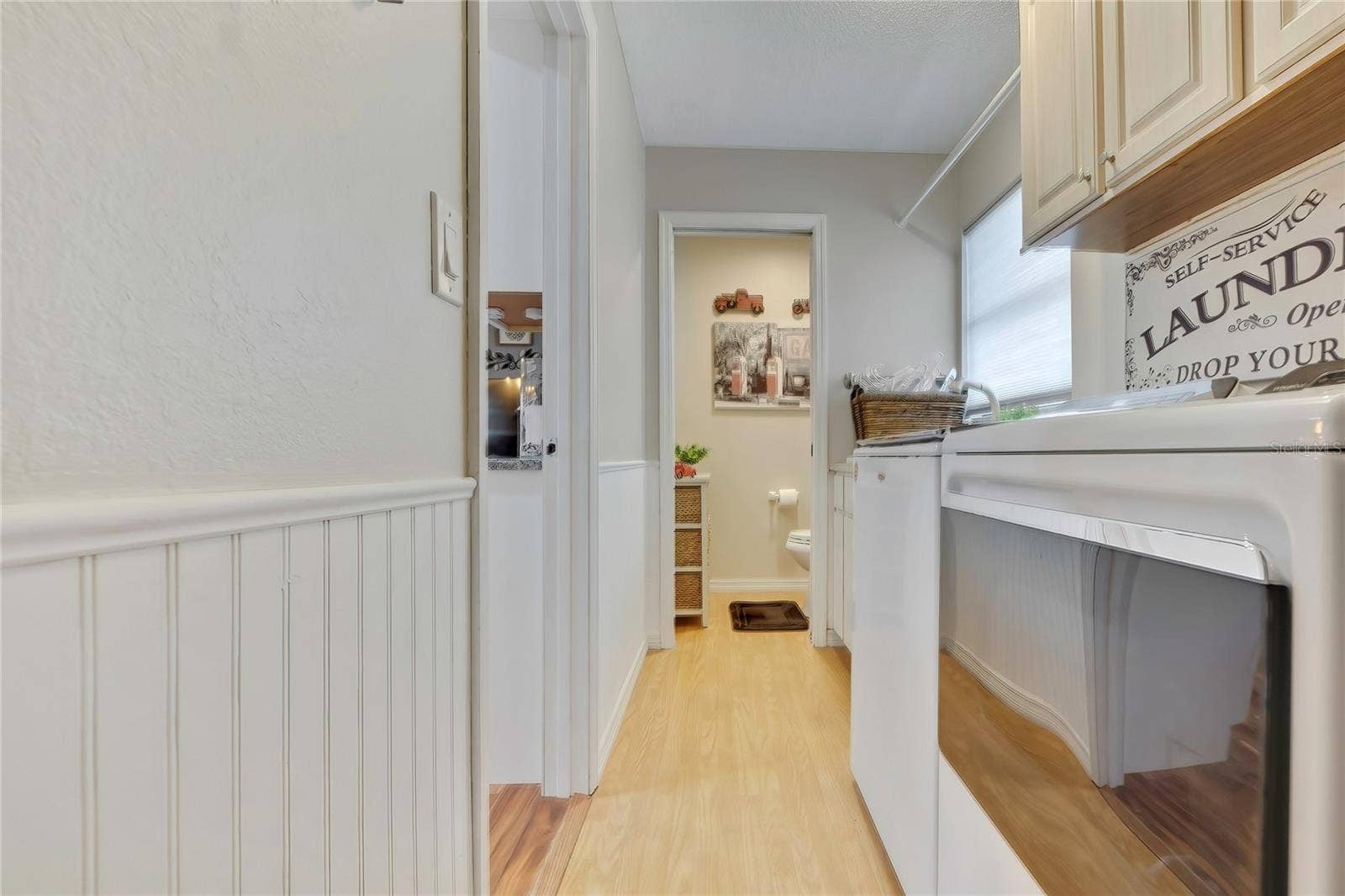 8098 SHORECREST COURT, Spring Hill, FL 34606 Laundry Room/1/2 Bath
