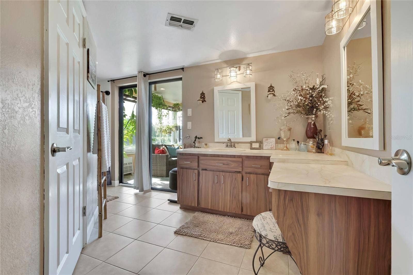 8098 SHORECREST COURT, Spring Hill, FL 34606 Guest Bathroom Leading out to the Patio/Pool