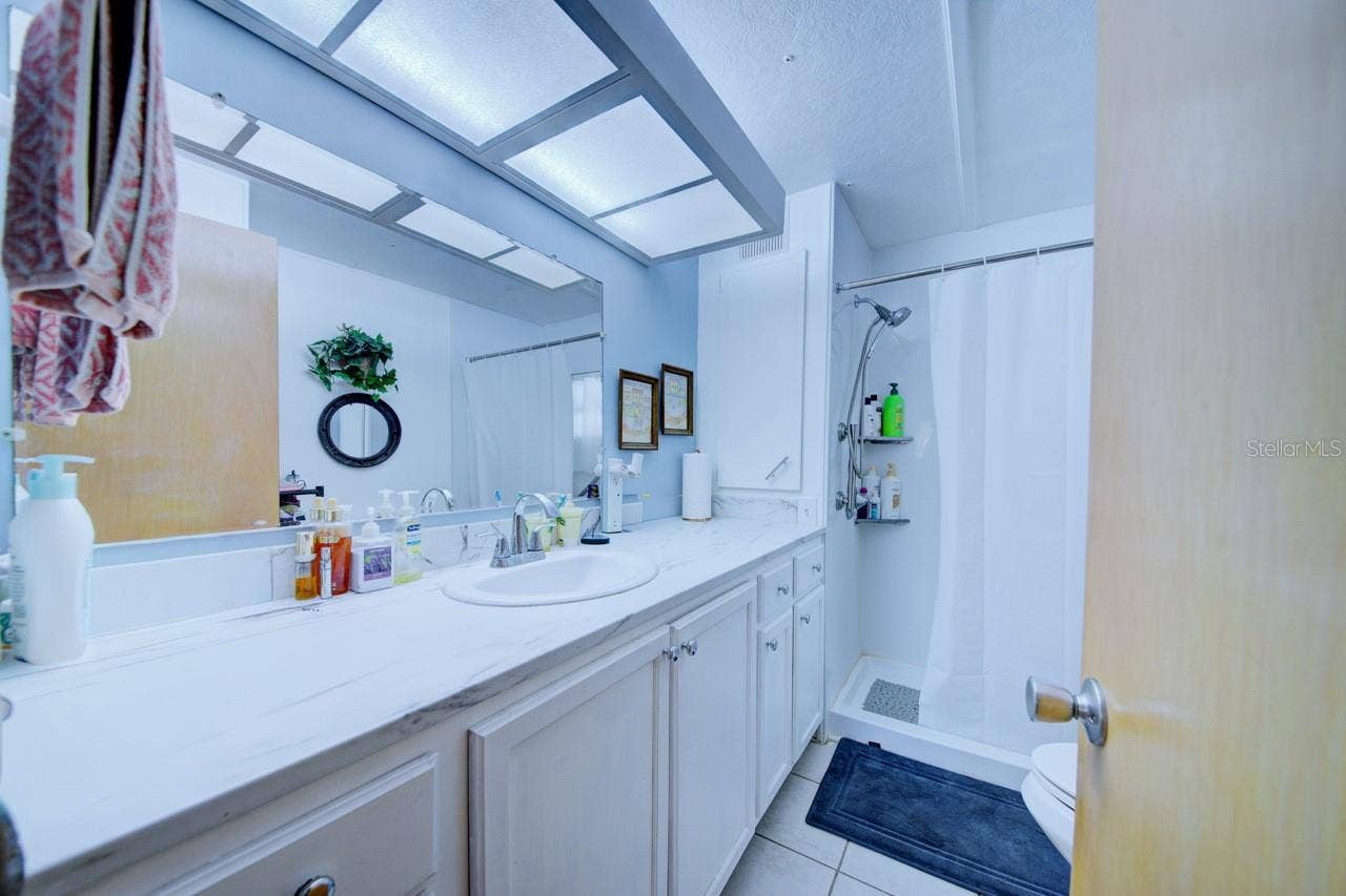 76 LIBERTY WAY, #5, Palm Harbor, FL 34684 Main BathroomWalk In Shower