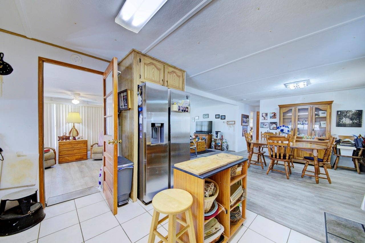 76 LIBERTY WAY, #5, Palm Harbor, FL 34684 Flex Room off kitchen, and living room.