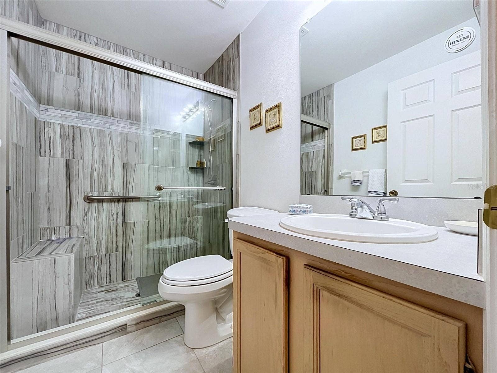 27408 CORAL SPRINGS DRIVE, Wesley Chapel, FL 33544 Gorgeous, remodeled shower and tile floor