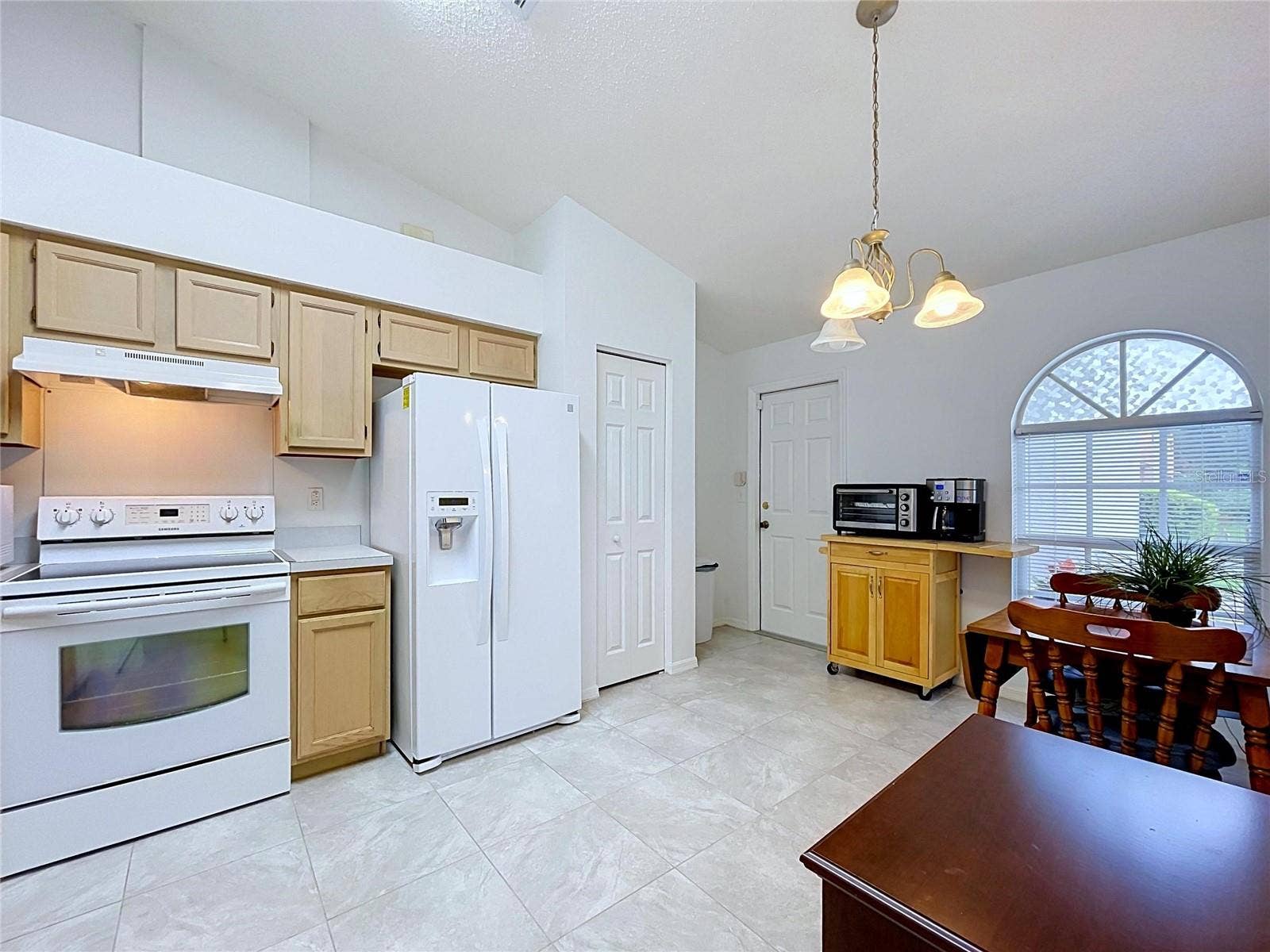 27408 CORAL SPRINGS DRIVE, Wesley Chapel, FL 33544 Built-in pantry is by refrigerator