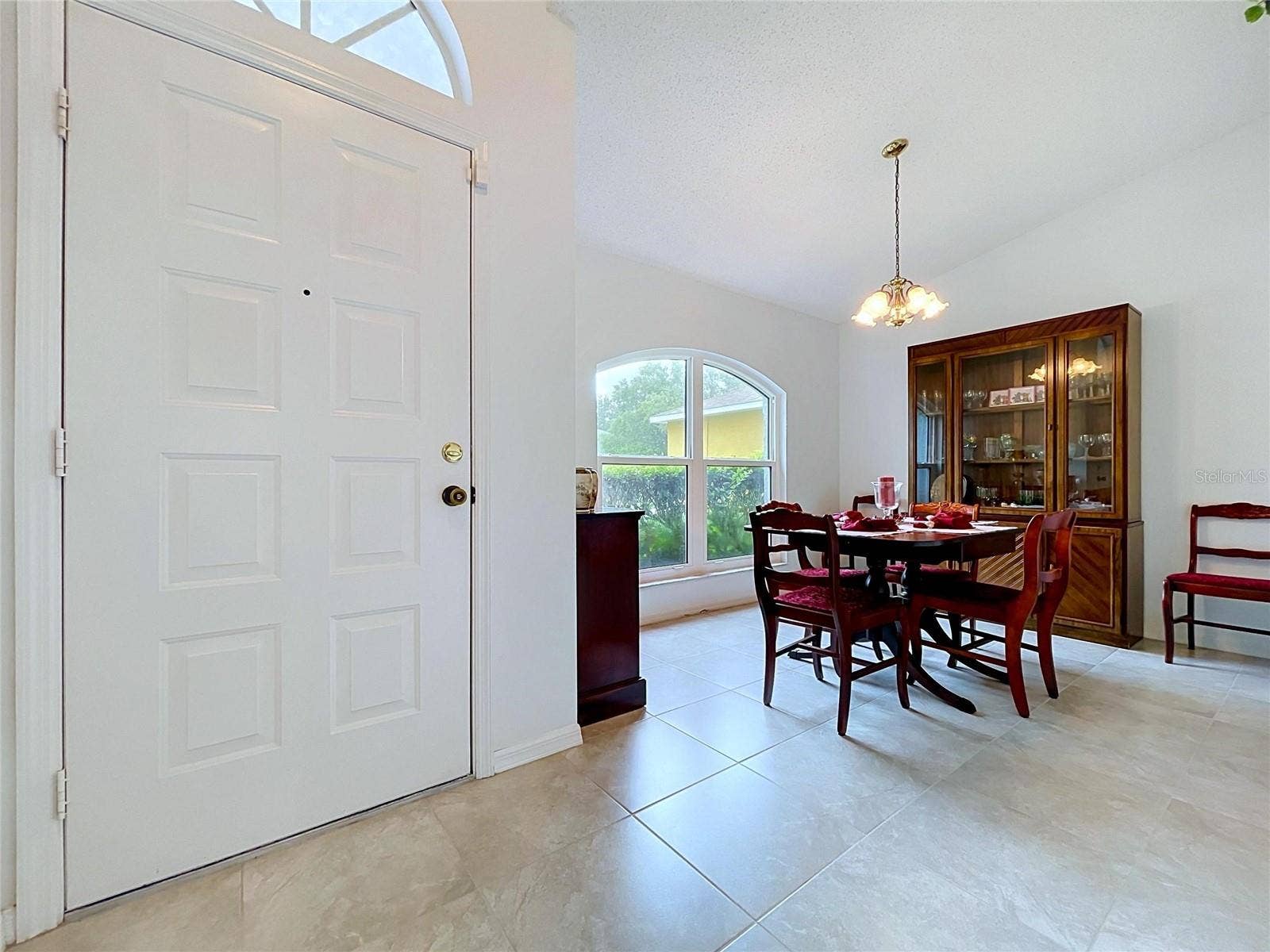 27408 CORAL SPRINGS DRIVE, Wesley Chapel, FL 33544 Front entry on glistening porcelain tile floor