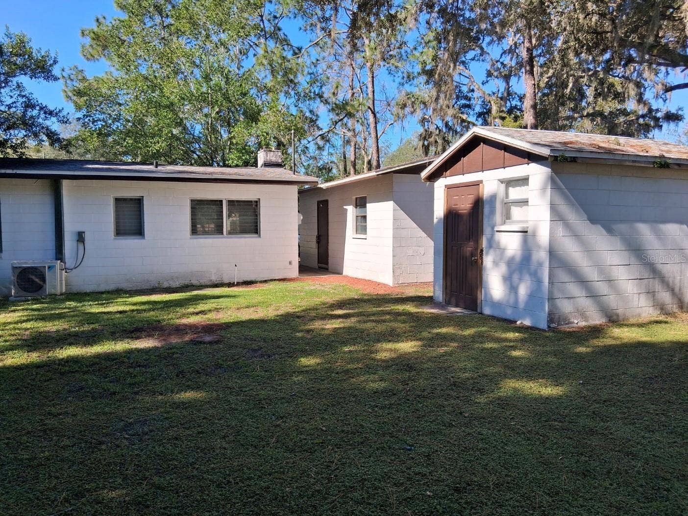10052 LAKE DRIVE, New Port Richey, FL 34654 Rear of house & shed