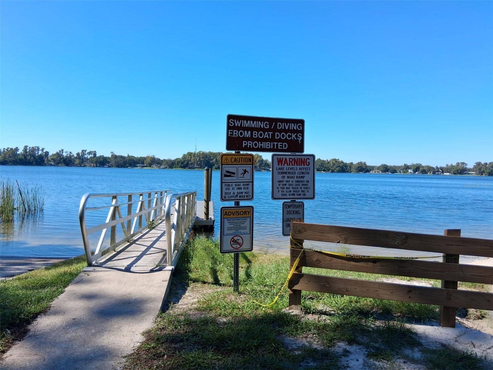 10052 LAKE DRIVE, New Port Richey, FL 34654 Park signs at boat ramp and pier