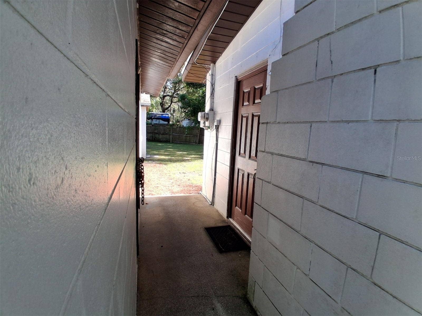 10052 LAKE DRIVE, New Port Richey, FL 34654 Covered entry